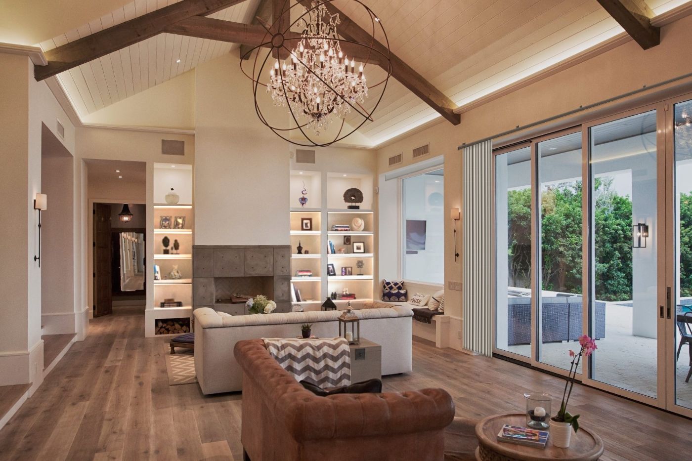 The living room in the Entertain scene, shelves and chandelier lit